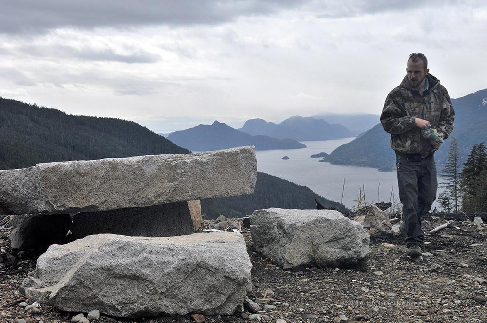 Geoff looking over a real granite table and chair set! Howe Sound in the distance