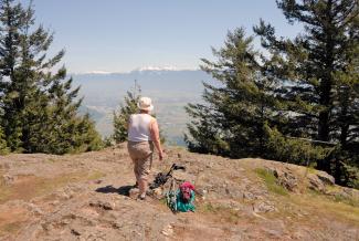 Carolyn on Sumas Peak looking across to the Cheam range